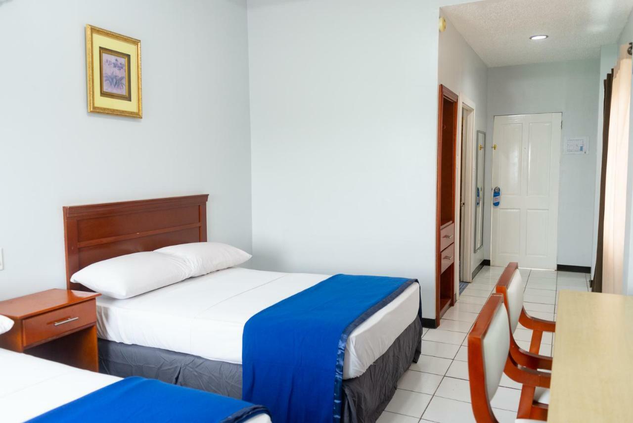 Status Hotel Georgetown Extérieur photo